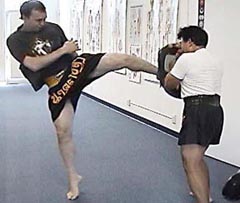 Daniel Carr trains the Muay Thai round kick.